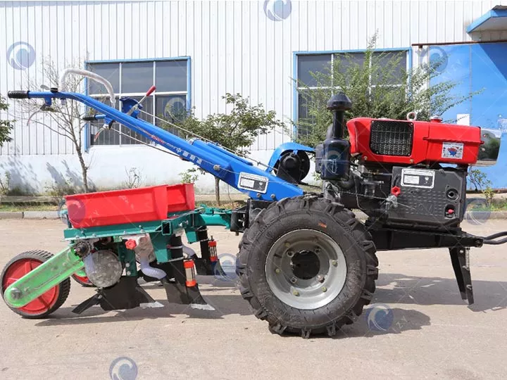 hand walking tractor with corn planter 